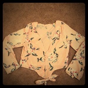 Light pink wrap/button up crop top